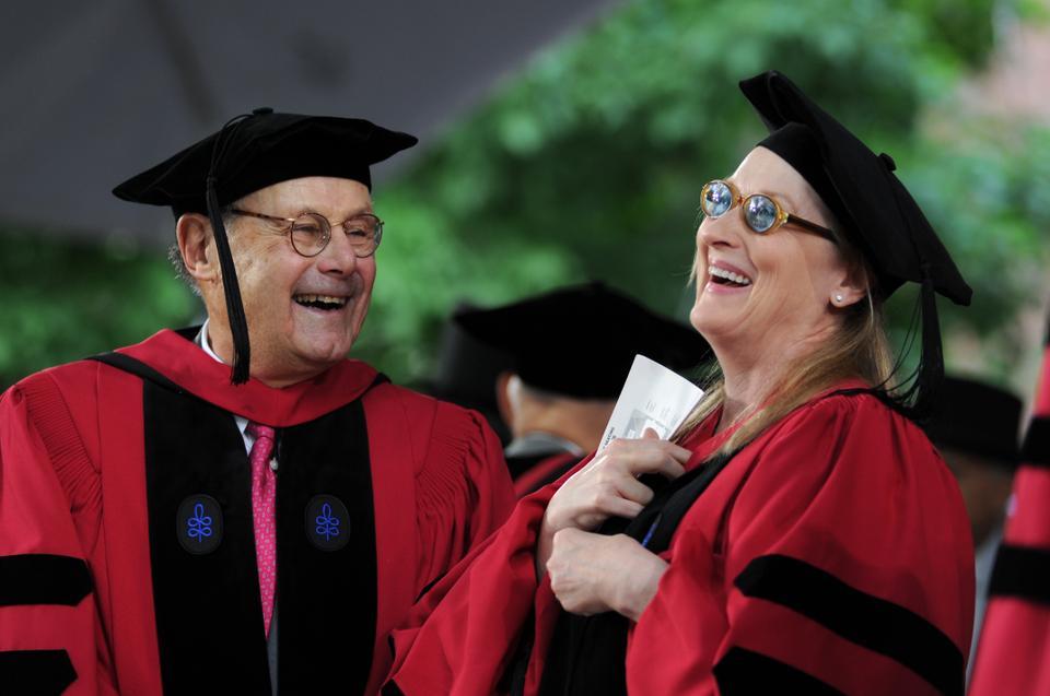 Professor David G. Nathan '51 and actress Meryl Streep share a laugh during morning exercises of Harvard's 359th Commencement on May 27, 2010 .  Nathan received the honorary degree of Doctor of Science while Streep was recognized as Doctor of Arts.