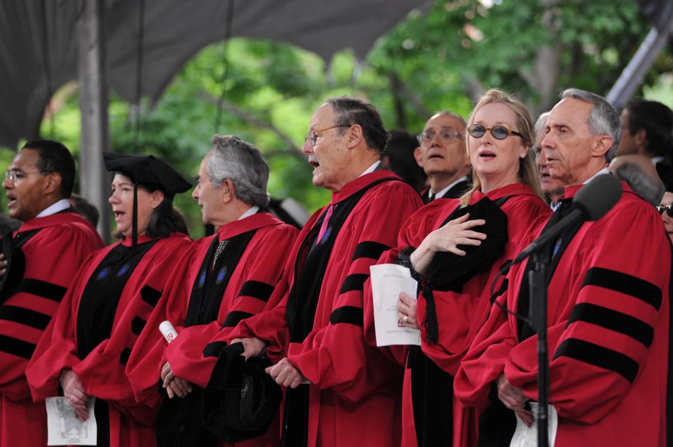 The recipients of honorary degrees join the Commencement Choir and University Band in singing The Star-Spangled Banner at the start of morning exercises on May 27, 2010.