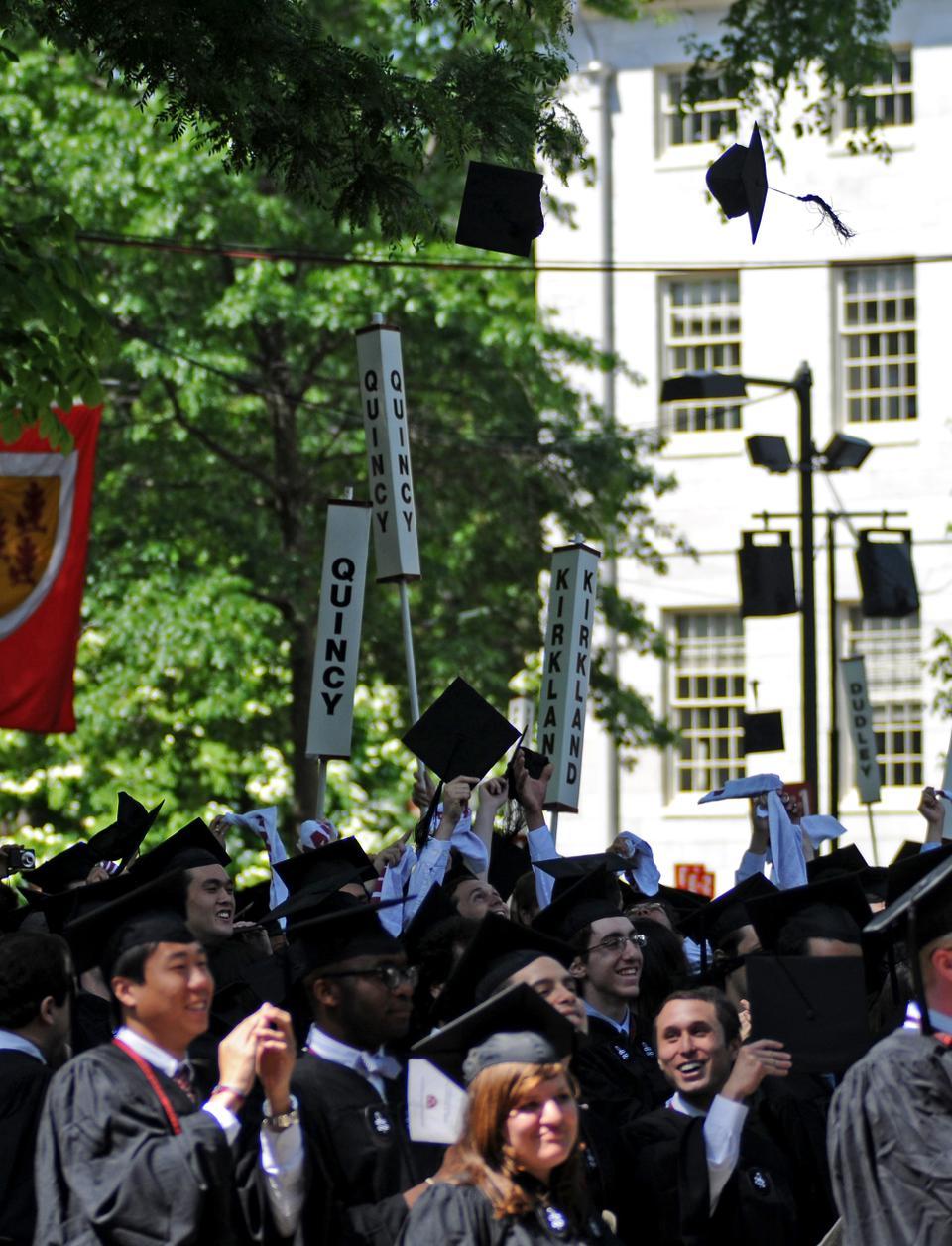 Graduation caps fill the air in Tercentenary Theatre following the official graduation of the Harvard College Class of 2010 on May 27, 2010.