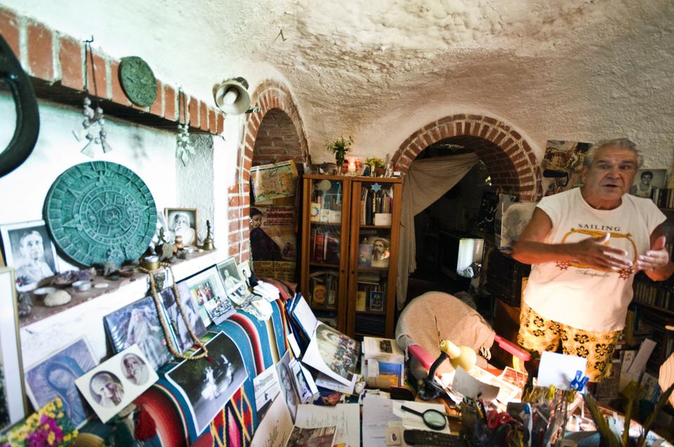 A "caveman" gives a tour of his home, which is located inside a cave in the mountains of Granada.