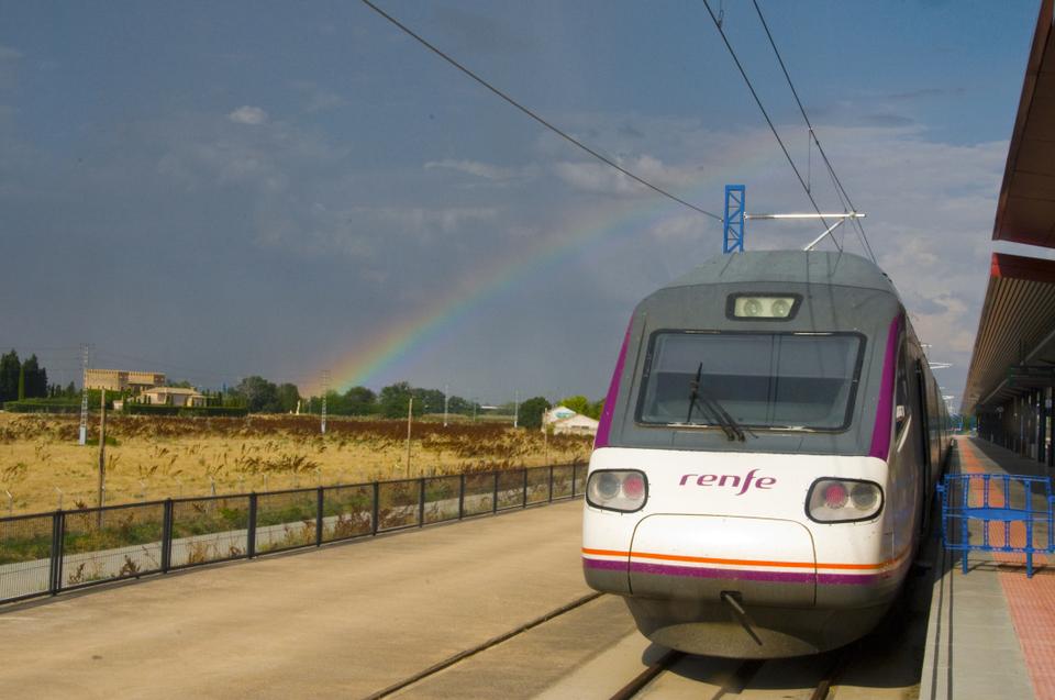 A rainbow forms over a train station in Toledo, Spain after a quick rainstorm. 