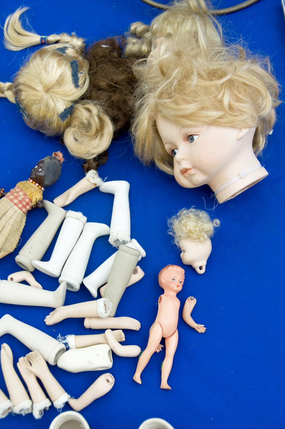 Assorted doll parts for sale at Feira da Ladra, Lisbon's biggest flea market.  Translated literally, it means "thieves' market."