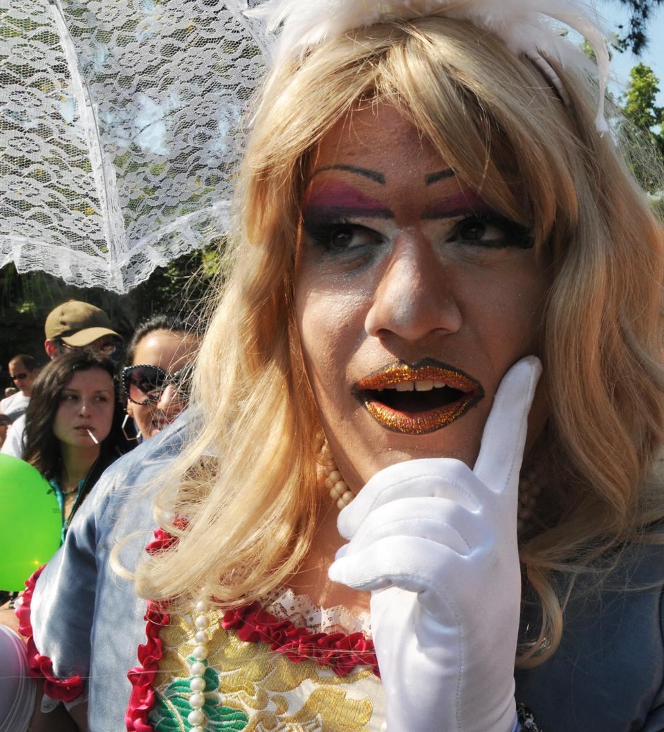 A participant in Barcelona's Gay Pride Parade 2010 poses for the camera before the parade begins.