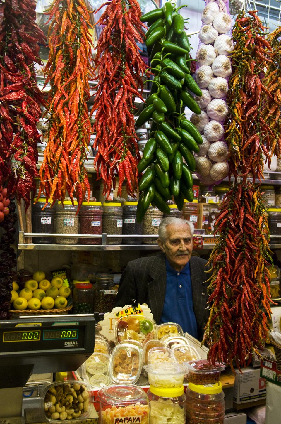 Spices and vegetables line the stand of this vendor in Barcelona's Boqueria located on Las Ramblas.