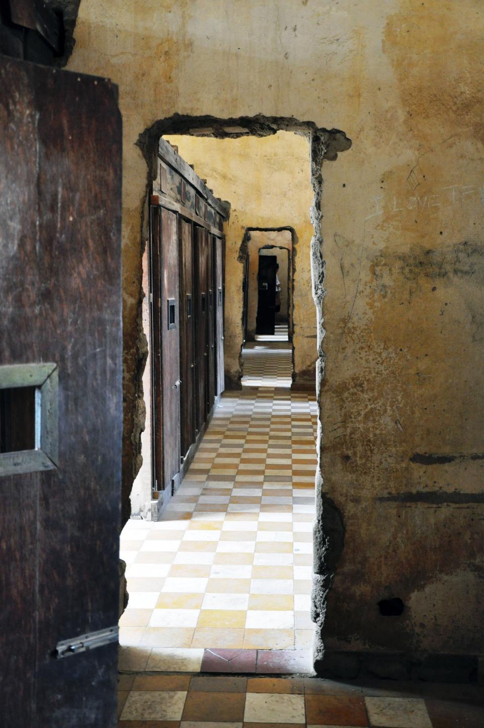 This picture was taken at the Tuol Sleng Museum, a site that once served as Security Prison 21 (S-21) where victims were taken by the Khmer Rouge regime to be tortured and interrogated. 