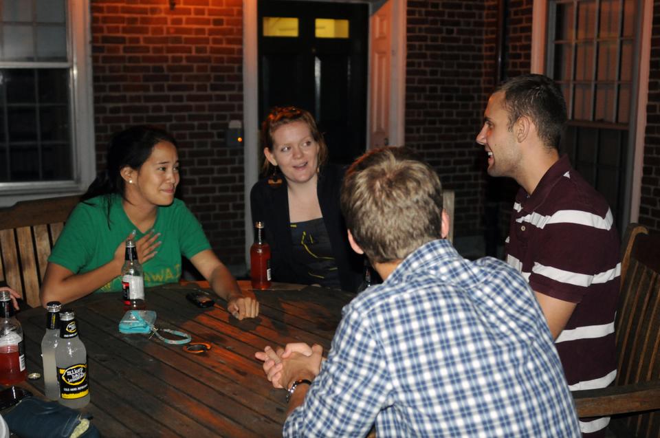 Winthrop residents enjoy a night outside on the Winthrop House patio drinking beverages and eating smores as part of the bi-weekly Stein Club organized by the House Committee.