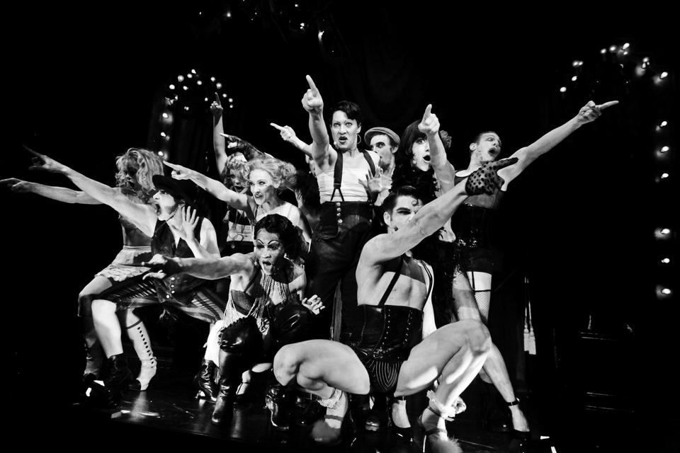 Members of the Kit Kat Klub reach out to audience members in the American Repertory Theater’s production of “Cabaret,” which runs through October 30 at OBERON.