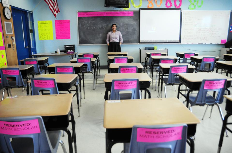 Teach for America corps member Pia Dandiya ‘09 teaches math classes at Garfield Middle School in Revere, MA. Motivational slogans surround every corner of her classroom. The ones on the back of the students’ chairs are printed on bright pink paper and say “Reserved: Math Scholar.”