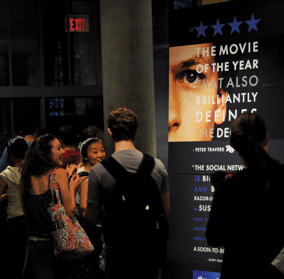 Harvard affiliates and Harvard Film Archive members line up for a screening of the film The Social Network yesterday. 