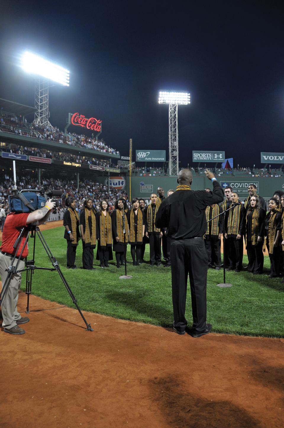 The Kuumba Singers of Harvard College, directed by Sheldon K. X. Reid ’96, perform the national anthem before the Boston Red Sox took on the Baltimore Orioles on September 22, 2010.