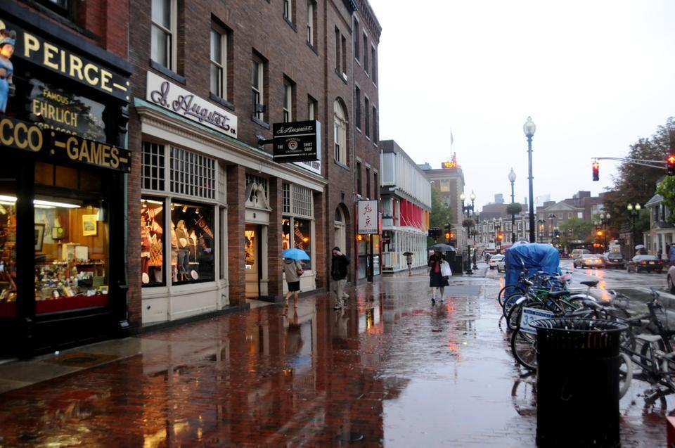Heavy rain greeted the square late Tuesday afternoon, flooding the brick walkways along Massachusetts Avenue.