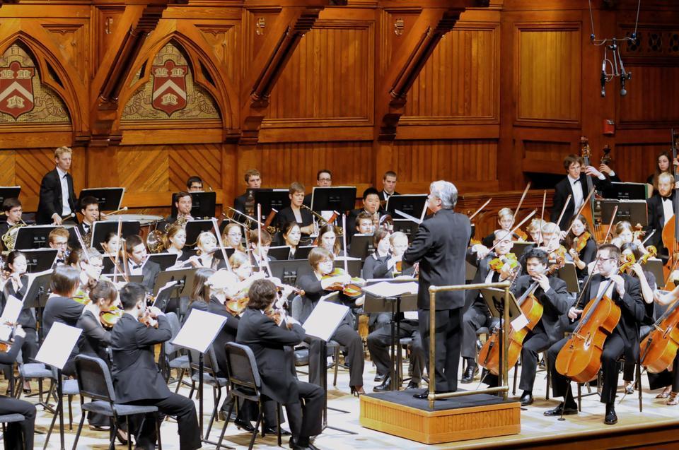 Bruce Hangen conducts the Boston Conservatory Orchestra in a performance of Debussy’s “Iberia” in Sanders Theater, Memorial Hall on Sunday afternoon.