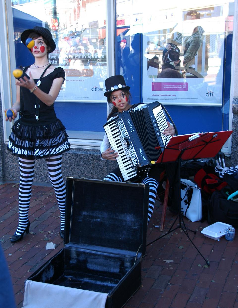Street artists perform at Saturday's Oktoberfest celebration in Harvard Square