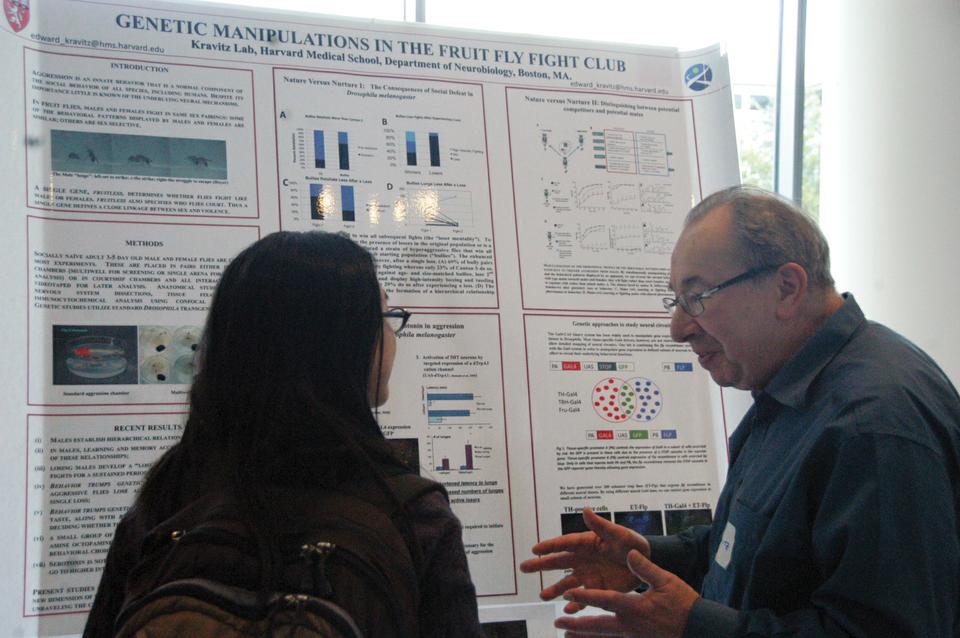 Neurobiology Professor Edward A. Kravitz explains his research on aggression in the fruit fly during the Life Sciences Research Fair, held in Northwest Labs yesterday. 
