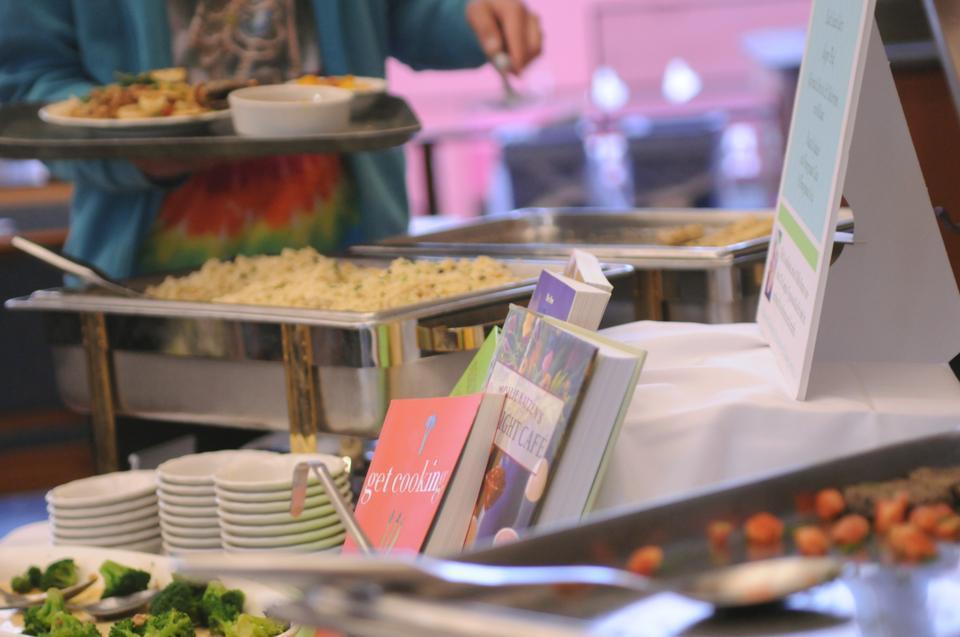 Residents of Quincy House dine on the “The Complete Vegetarian Meal,” which featured food by chef and cookbook author Mollie Katzen yesteday. 