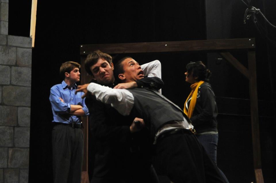 Spencer J. Home ’14 struggles against an attack in the production “The Spanish Tragedy.”