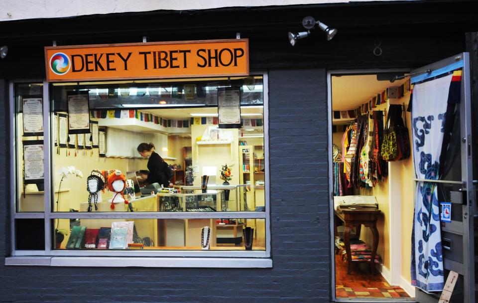The Dekey Tibet Shop opens its doors on Bow Street in the location that formerly housed the video rental store Quick Flix. 