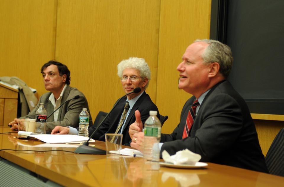 Political analyst Bill Kristol (right) and William A. Galston (center) of the Brookings Institute discuss the implications of Tuesday’s elections for American politics. 