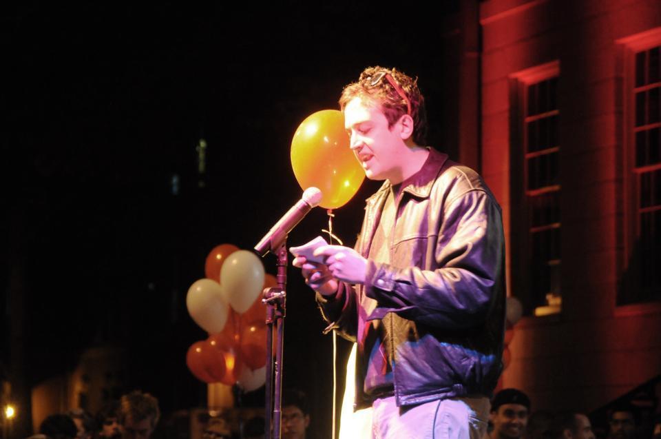 Peter Davis '12, one of three candidates vying for the position of vice president of the Undergraduate Council, jokes about Drew Faust in front of crowds of undergraduates at the Harvard-Yale Pep Rally in Harvard Yard last night.