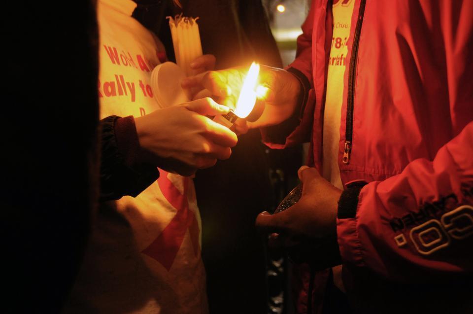 Students come together to carry out the charge to "Act Aware", the theme for World AIDS Day 2010.   
