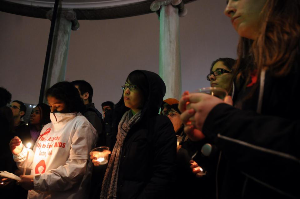 Rally goers listen to speeches, spoken word,  and musical performances to commemorate the lives lost to the AIDS epidemic.