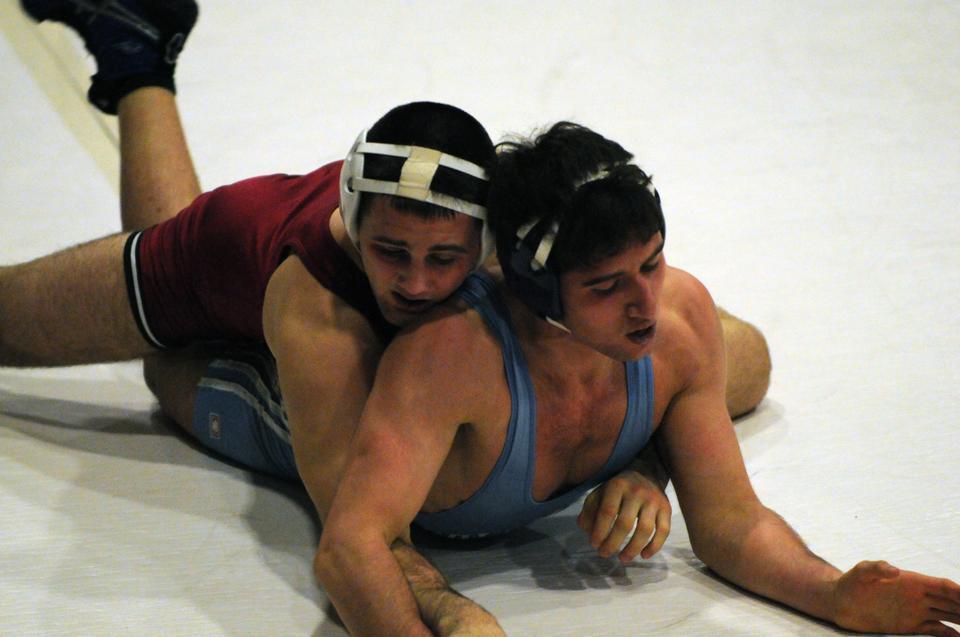 Sophomore co-captain Walter Peppelman, shown above in earlier action, finished in fourth place at the Cliff Keen Las Vegas Invitational. Teammate Corey Jantzen made it to the finals but the junior came in second place.  