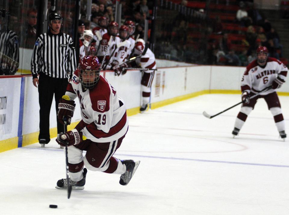 Junior forward Alex Killorn, shown above in earlier action, had his 10-game point streak broken by Northeastern. The Crimson, despite forcing the Huskies’ goaltender to save 34 shots, failed to score in the physical loss.