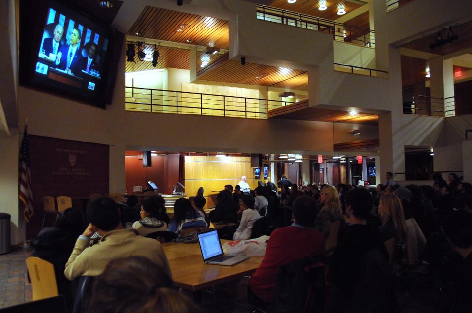 Students listen to President Obama’s address at a State of the Union viewing organized by the Institute of Politics.