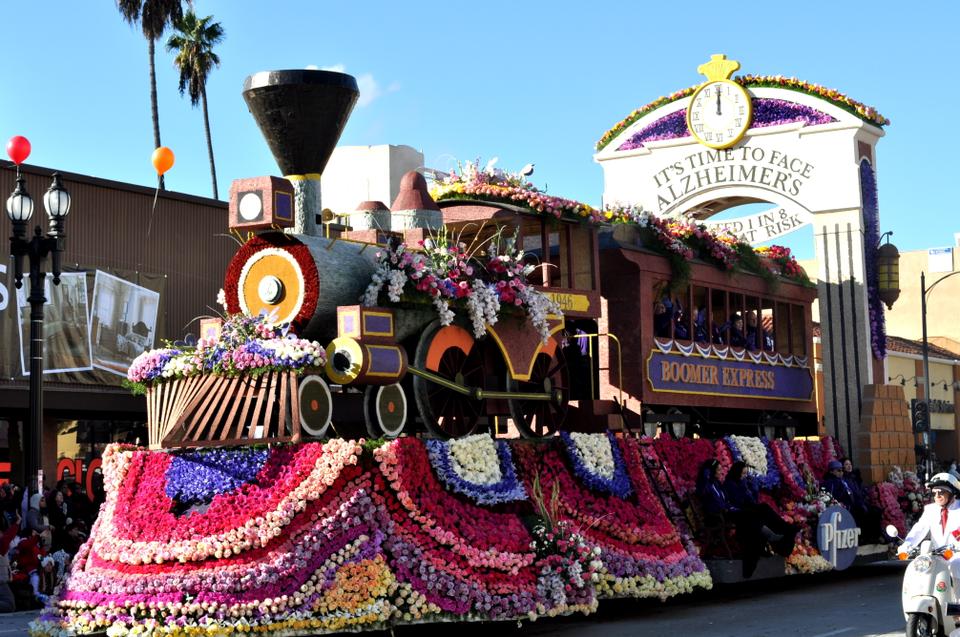 A banner on a train-shaped float raised awareness about impacts of Alzheimer's disease during The Rose Parade in Pasadena, CA.