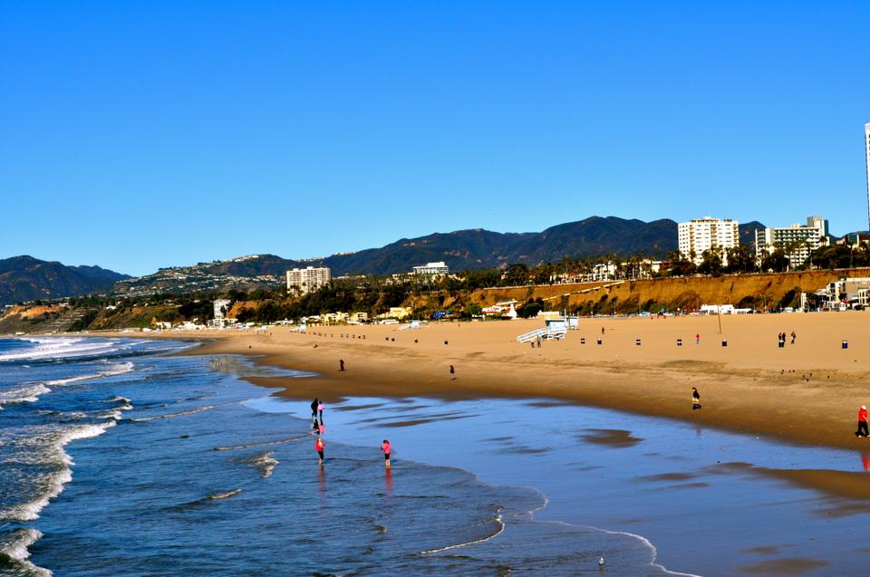Beach goers enjoy the winter sunshine at Santa Monica Beach, CA. 