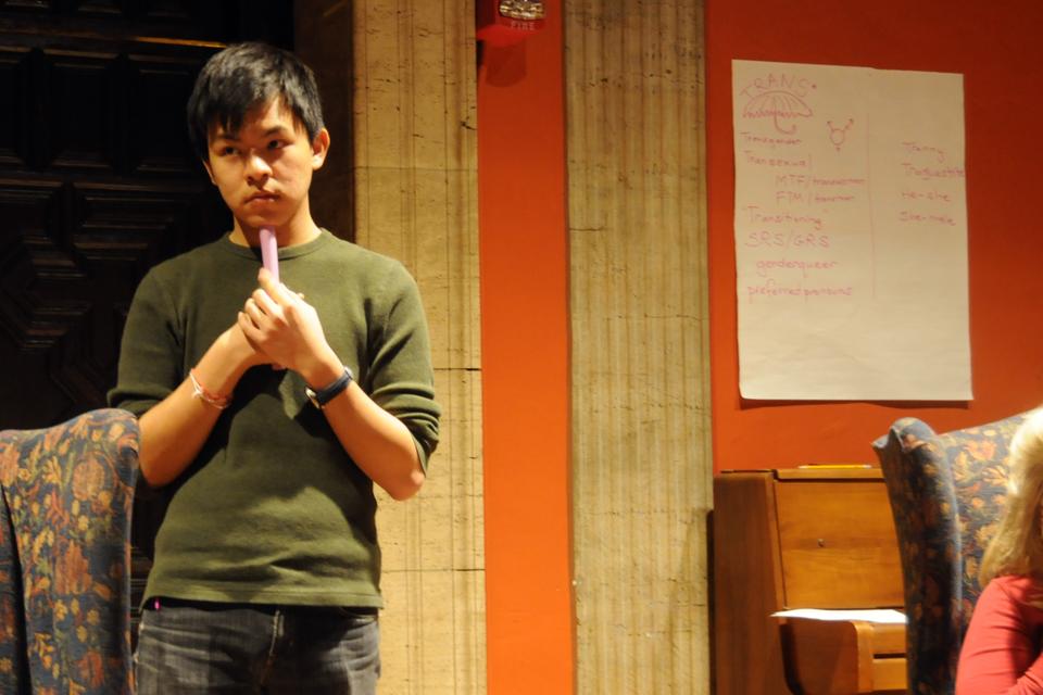 Jia Hui Lee ’12 discusses the issue of transgender students' involvement with the military at the Harvard College Democrats' meeting last night.