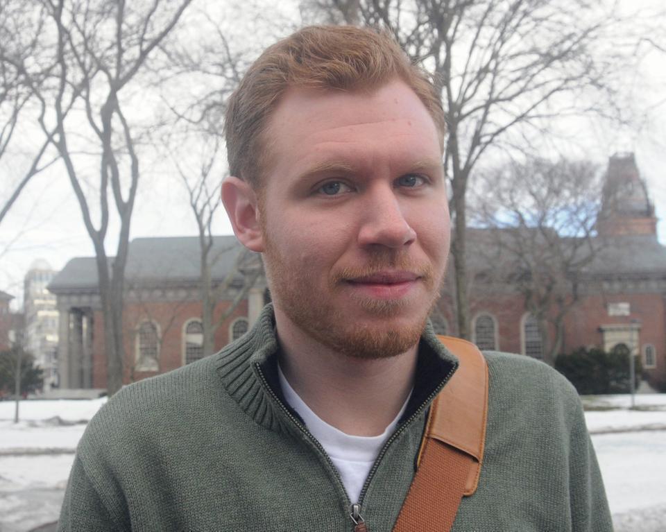Bonus point for being the only person who knows what "smize" means. Another bonus point for the sling bag that matches his hair color.