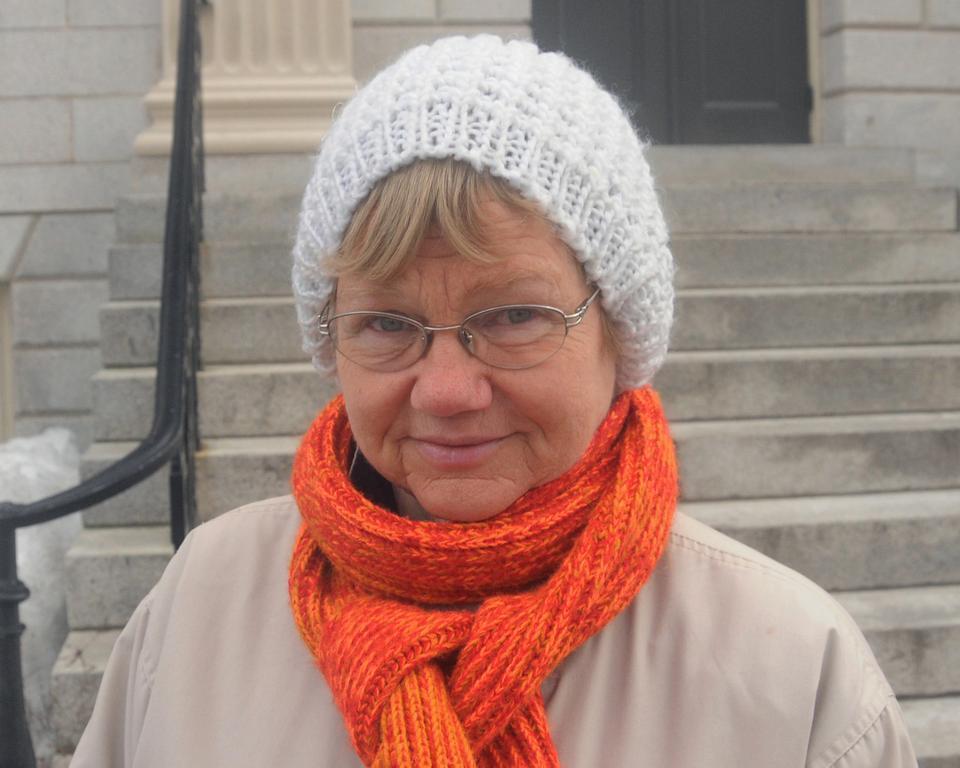 Her gaze is just as fiery as her bright orange scarf. Too bad ANTM has an age limit.
