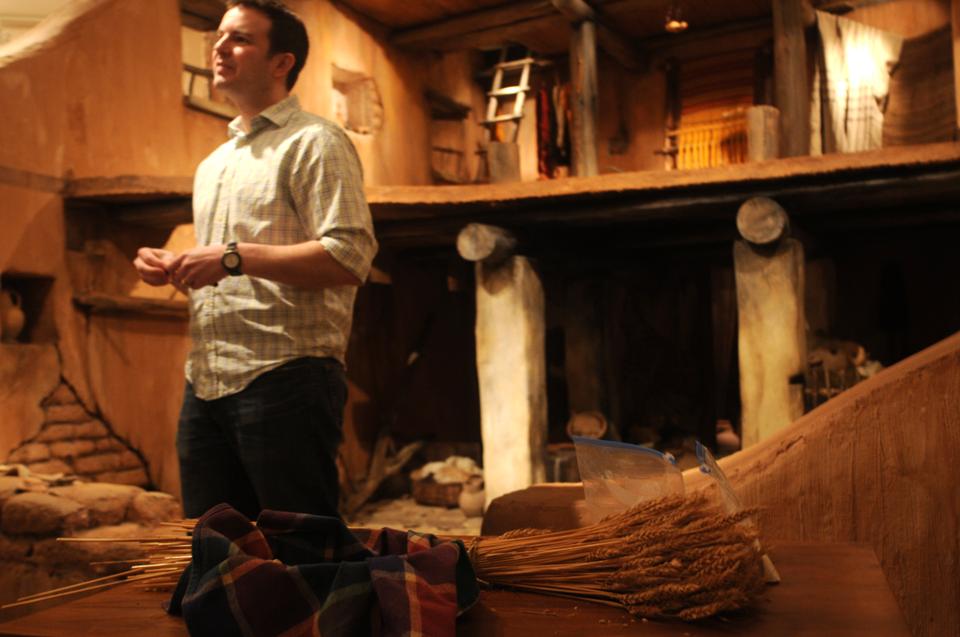 Adam Middleton, docent at Harvard's Semitic Museum, introduces local children to the Iron Age diet at the museum's Ancient Israelite Bread Making Tour on Thursday afternoon.