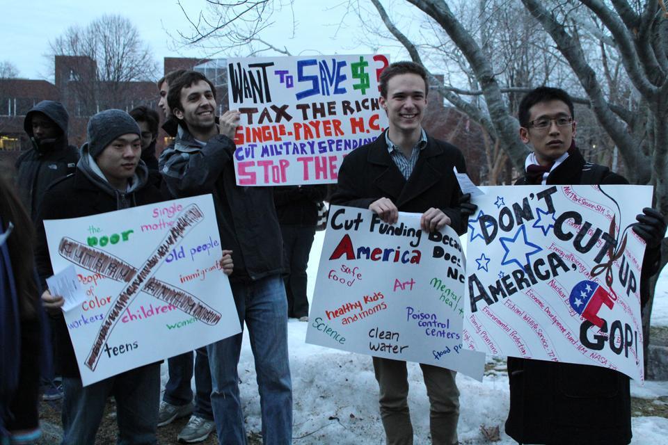 Protesters at the anti-Eric I. Cantor rally demonstrate against federal budget cuts.