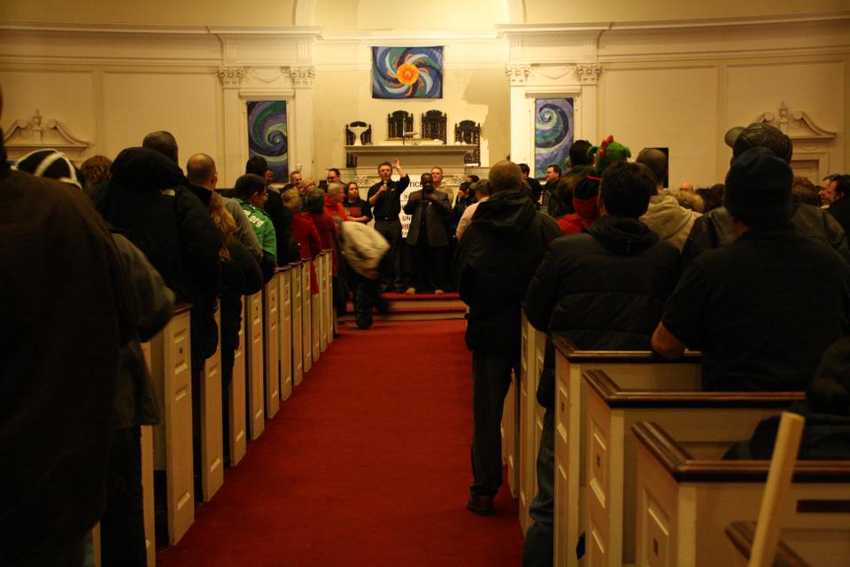 Harvard dining hall workers, Local 26 union representatives, and the Student Labor Action Movement (SLAM) came together at First Parish Church in Cambridge to rally in support of Harvard's dining hall staff.