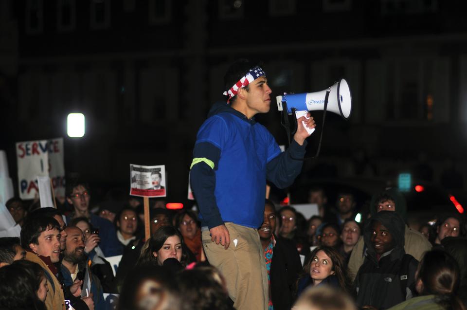 The Rally to Save AmeriCorps brings together students from Harvard and Greater Boston as well as members of AmeriCorps to speak out against House Majority Leader Cantor’s budget cuts.  Samuel B. Novey ‘11 amps the crowd as Cantor arrives at the IOP.