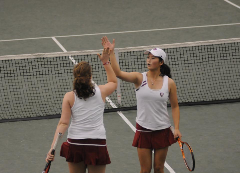 Junior co-captain Holly Cao (right) teamed up with freshman Hannah Morrill and eked out a 9-7 win at the No. 2 doubles spot in the squad’s 5-2 win over visiting Purdue yesterday.