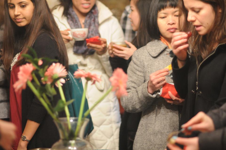 Adams residents and their parents enjoy a wide range of treats at Adams House's Junior Parents Weekend reception at the Masters' Residence on Friday, March 4.