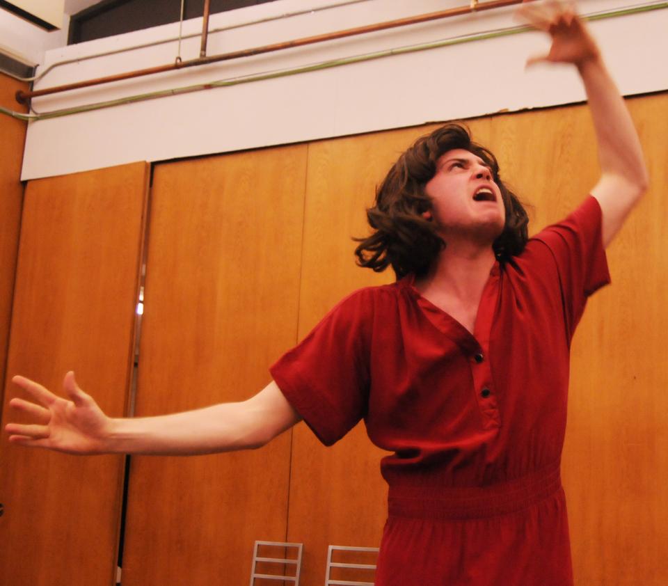 Nate Hilgartner, playing Lady Macbeth in the Hyperion Shakespeare Society's performance of "Titus Androgynous", makes the audience laugh with his cross-dressing antics.