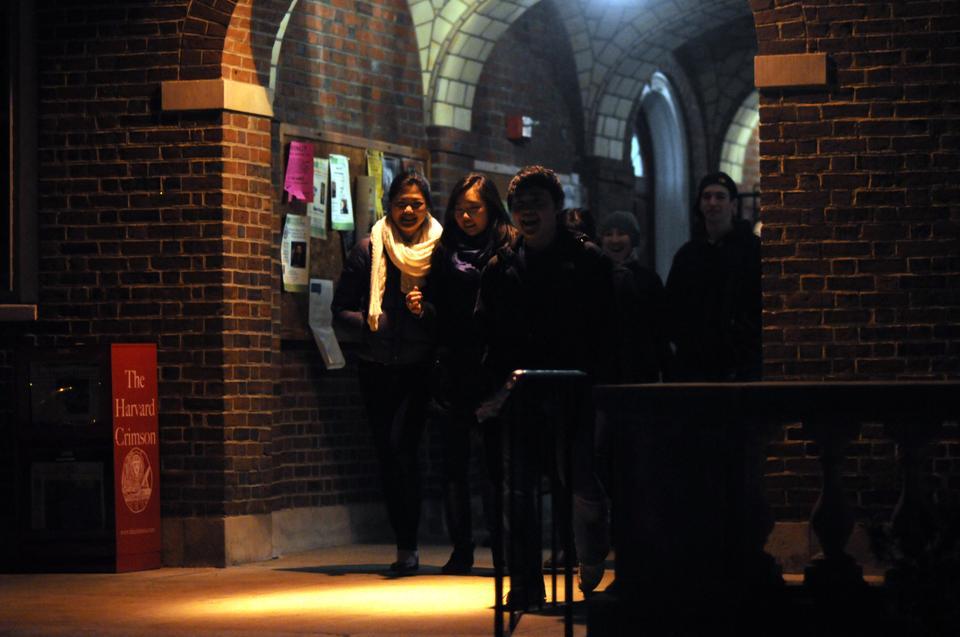 Freshmen enter through the Kirkland archway on Housing Day Eve.  Current Kirklanders welcomed freshmen with blaring music and the famous Kirkland Ode.