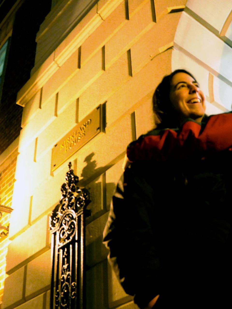 A Kirkland resident stands in archway to welcome freshmen. Freshmen were led into the courtyard where a group of Kirklanders welcomed them with the house ode.