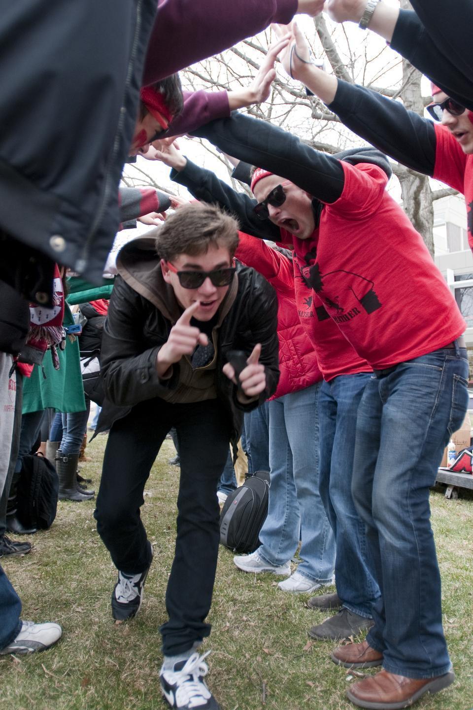 Mather House residents welcome their new freshmen outside Annenberg yesterday.