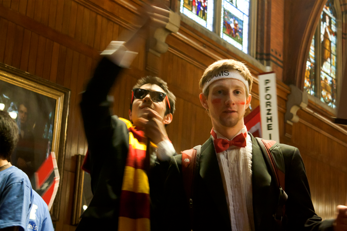 Adams House residents, dressed in house gear, celebrate Housing Day in Annenberg yesterday.