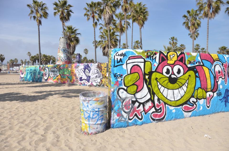The graffiti wall on the sand is a particularly vibrant attraction of Venice Beach. However, these walls aren't open to anybody; one must obtain a permit to spray paint these walls.