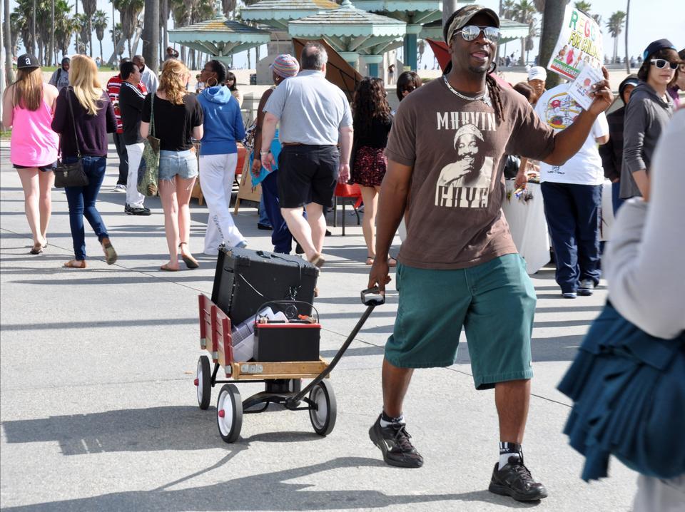 This man and his "Reggae for Kids" CD are fixtures at the Venice Boardwalk. On any given day, he can be seen wheeling around a boom box in a wagon, playing a funky reggae version of "The Itsy Bitsy Spider".