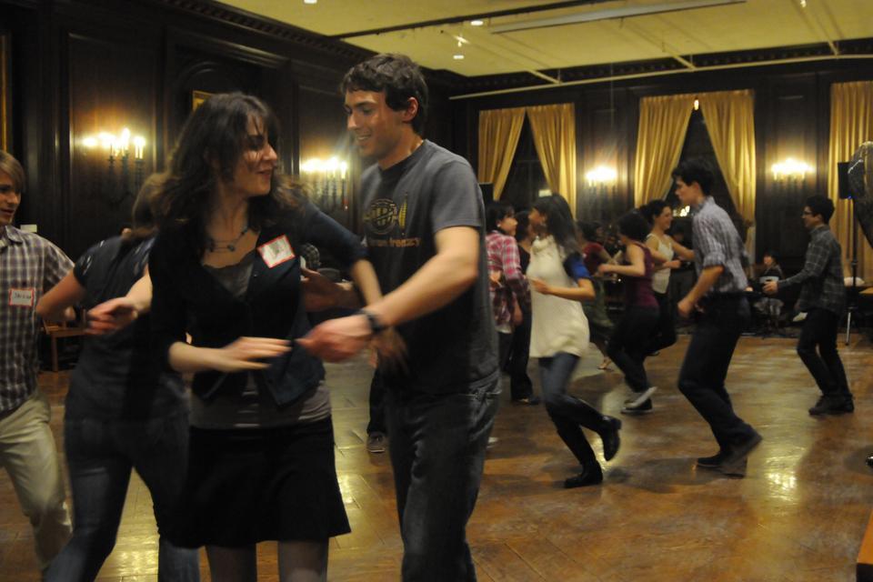 Harvard students take part in the Harvard Outing Club’s annual square dance last night. Free to all, participants quickly learned dance steps and hoed down to live music all night in the Adams House Dining Hall.