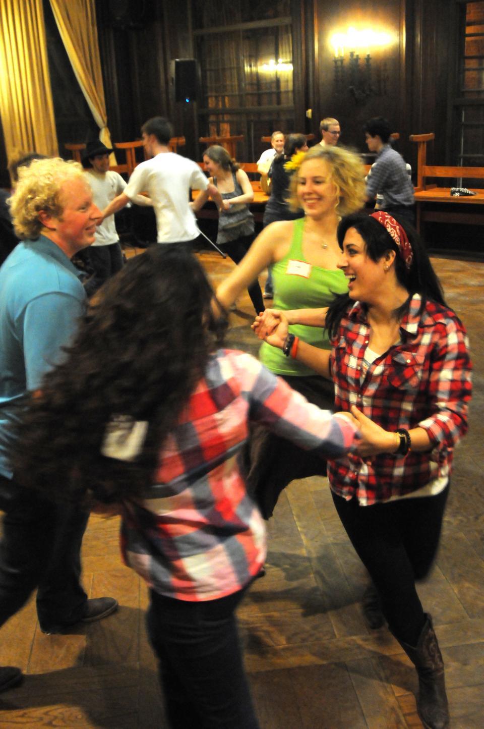 Harvard students participate in the Harvard Outing Club’s annual square dance last night. Free to all, students quickly learned dance steps and hoed down to live music all night in the Adams House Dining Hall.