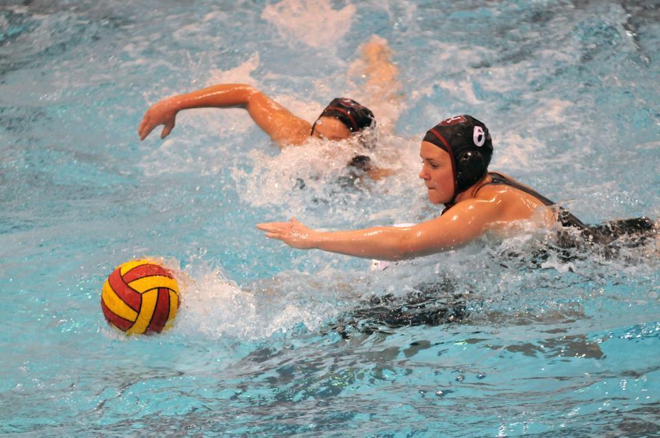 Junior Shannon Purcell, on the right, swims toward the ball in an effort to gain possession for the Crimson. Purcell scored two of Harvard’s 12 goals against Wagner. Junior co-captain Devan Kennifer was the leading scorer for the Crimson, tallying five goals, in addition to her five steals. 