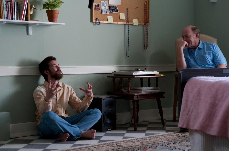 Gabe (Lou Taylor Pucci) and his father Henry (J.K. Simmons) bond through songs of the '60's in "The Music Never Stopped."